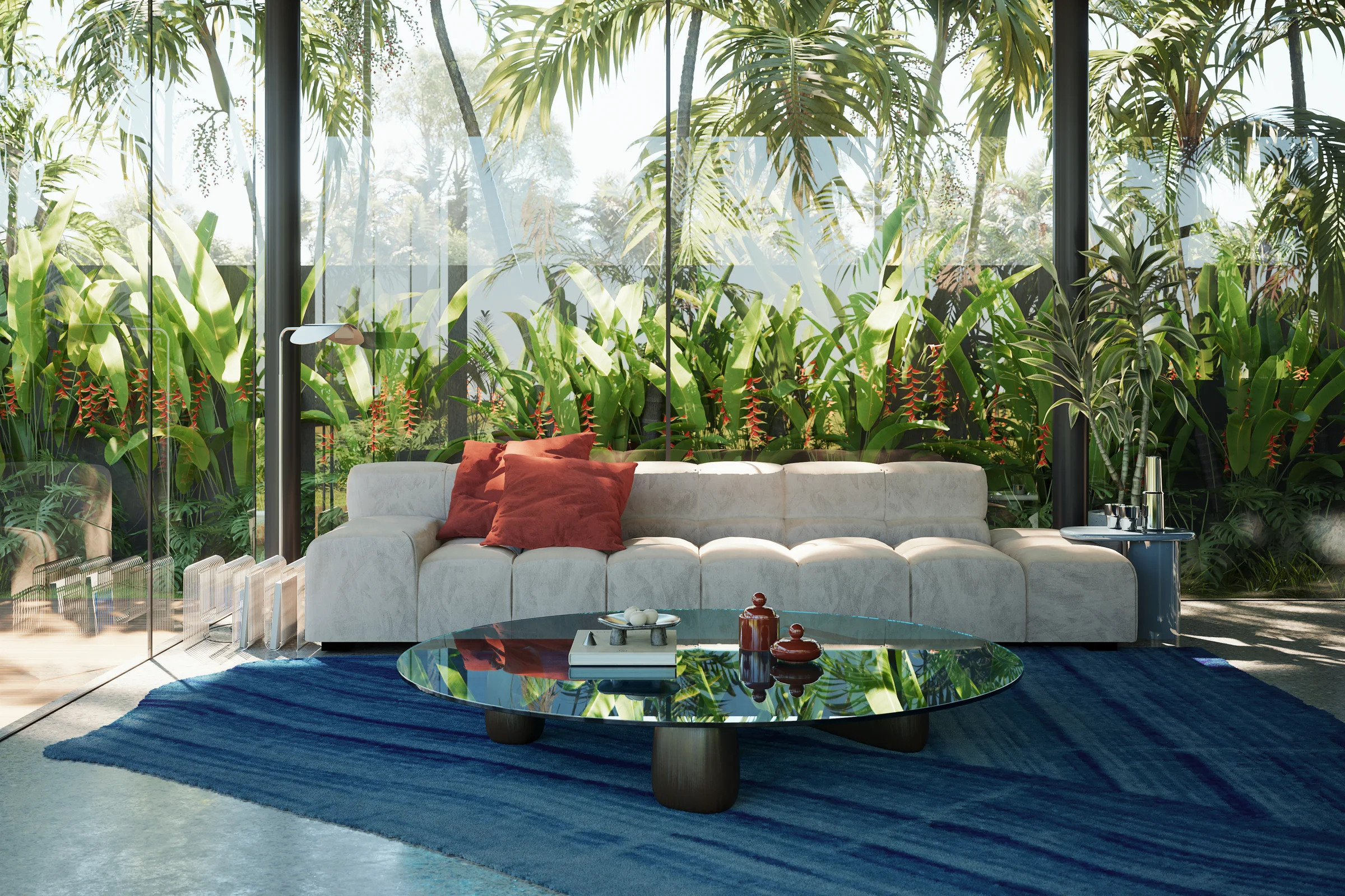 A sculptural sofa beside floor-to-ceiling garden windows